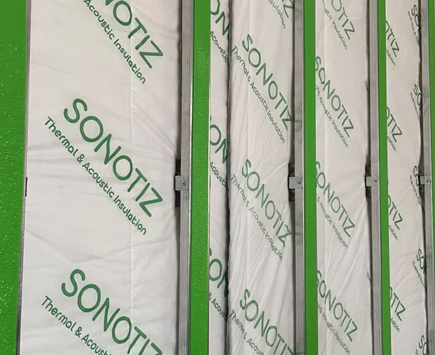 Sonotiz insulation panels in wall framing